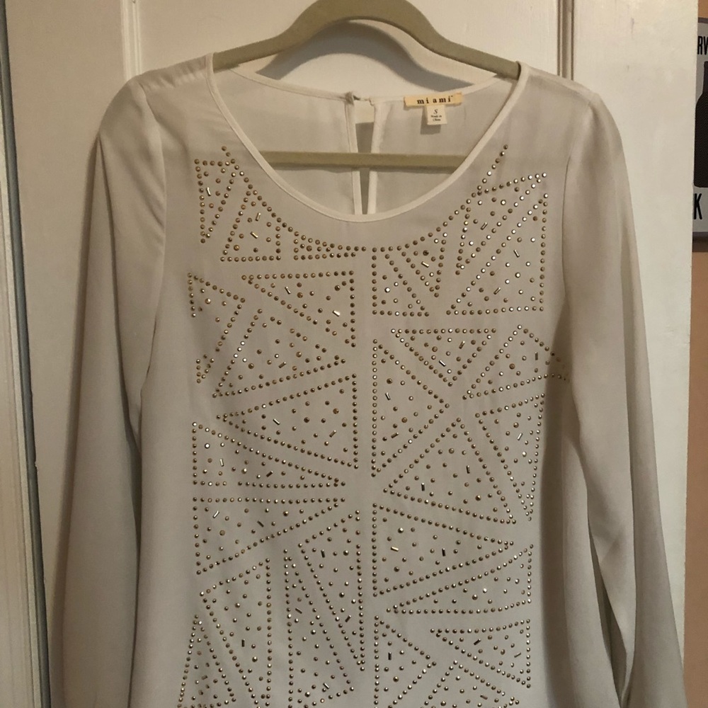 Francesca’s White Blouse with gold accent